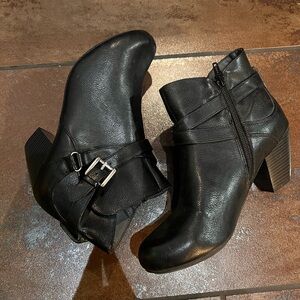 Black ankle booties with buckle detail